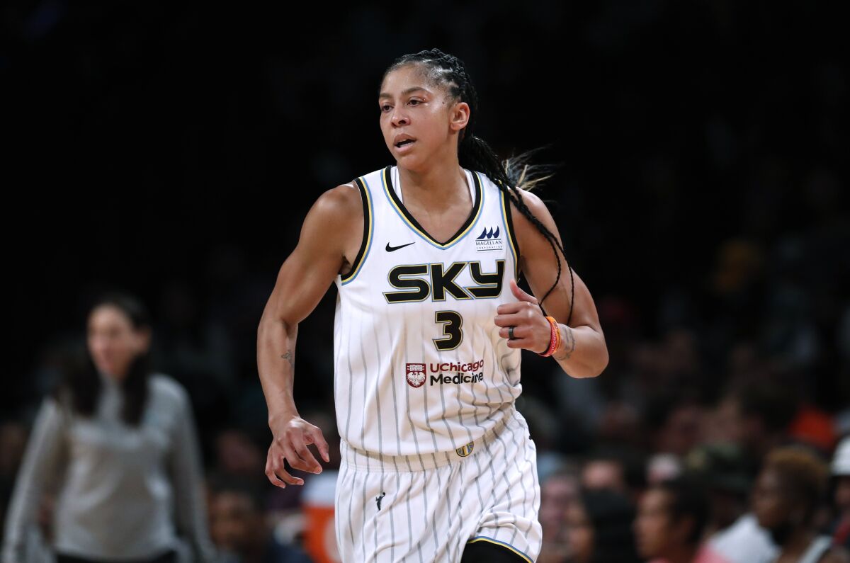 FILE - Chicago Sky forward Candace Parker runs up the court during the team's WNBA basketball game against the New York Liberty on Aug. 23, 2022, in New York. Parker announced on social media Saturday, Jan. 28, 2023, that she would sign with the defending champion Las Vegas Aces. Parker spent the past two seasons playing for her hometown Sky, leading Chicago to the WNBA championship in 2021. (AP Photo/Noah K. Murray, File)