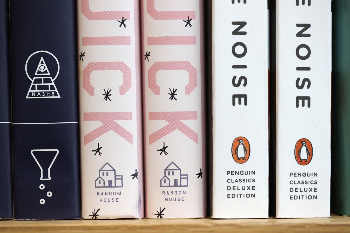 Five books on a shelf