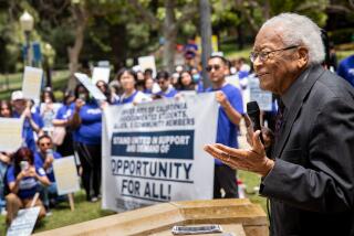 Los Angeles, CA - May 17: Civil Rights icon Rev. James Lawson speals at a rally before students and supporters gathered to support undocumented students in the University of California system, rallying and marching to protest outside a meeting of the UC Board of Regents meeting, on the UCLA Campus in Los Angeles, CA, Wednesday, May 17, 2023. The rally wants to demand the UC Board of Regents break legal ground and authorize the hiring of students who were brought to this country illegally as children and lack valid work permits. (Jay L. Clendenin / Los Angeles Times)