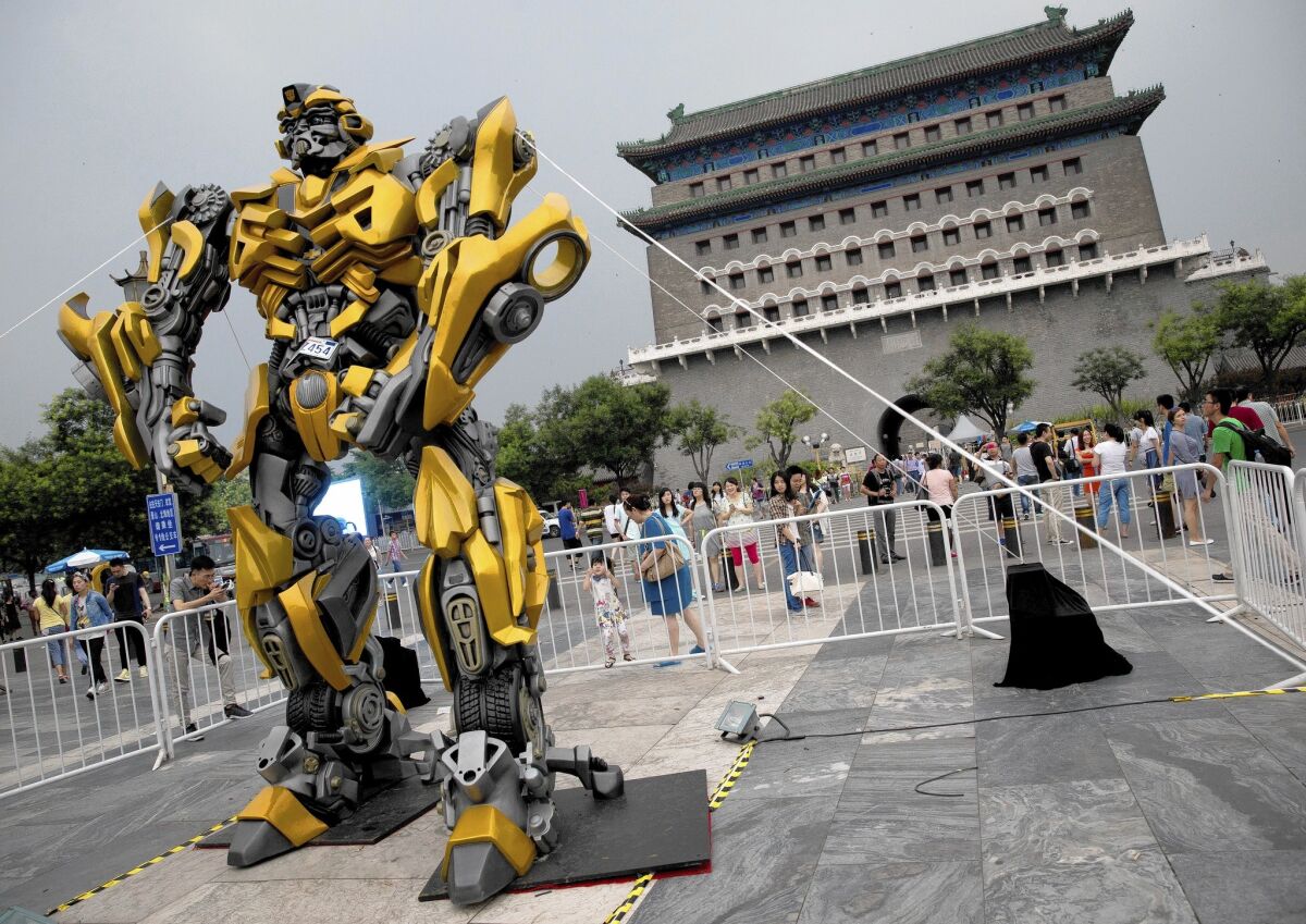 A model of "Transformers" character Bumblebee is displayed in Beijing as part of a promotion of the movie "Transformers: Age of Extinction."