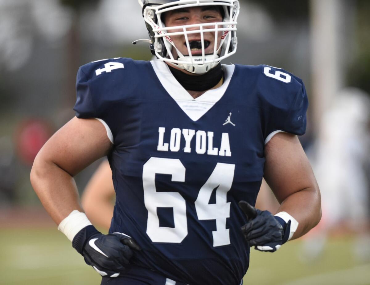 Loyola offensive tackle Sam Yoon is all smiles on the field.