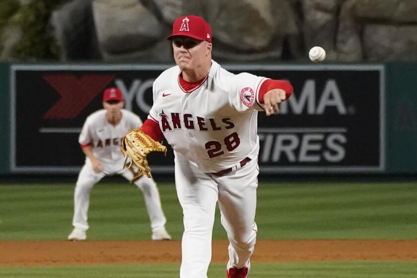 Los Angeles Angels relief pitcher Aaron Loup (28) throws during a baseball game.