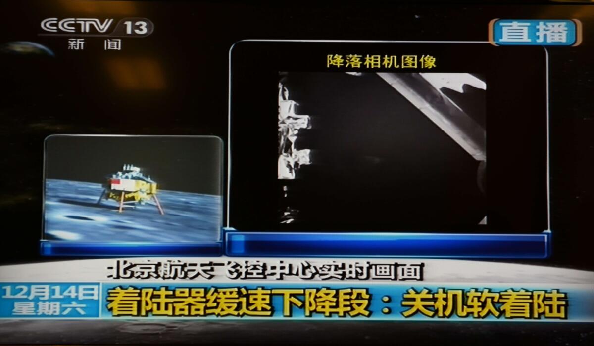 CCTV broadcasts an image, right, of China's first lunar rover after it landed on the moon.