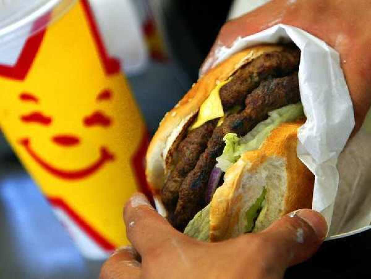 Carl's Jr. owner CKE postponed its planned IPO because of "market conditions."