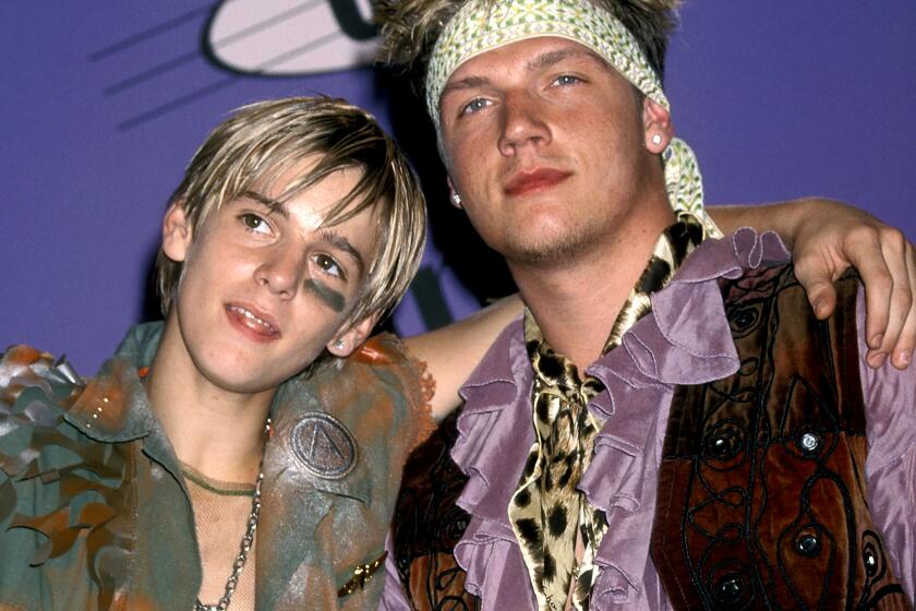Singer Nick Carter of the Backstreet Boys and brother singer Aaron Carter