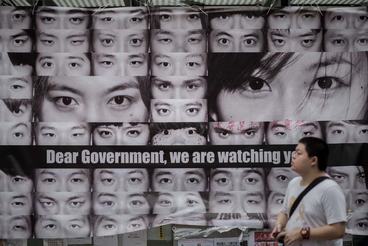 Posters showing the eyes of pro-democracy protesters are displayed in the Admiralty district of Hong Kong on Tuesday.