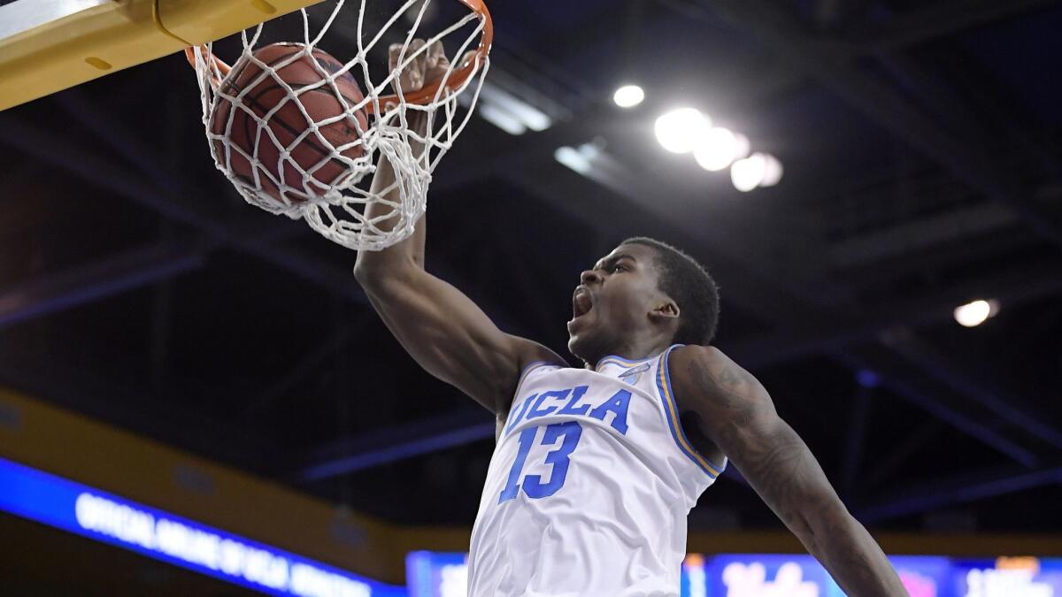 UCLA guard Kris Wilkes dunks against Loyola Marymount earlier this season.