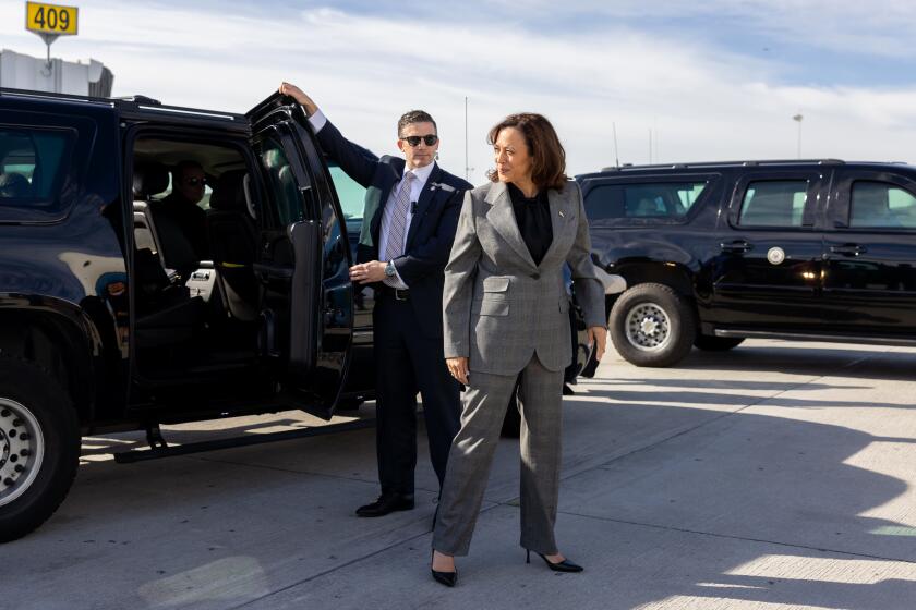 LOS ANGELES-CA-NOVEMBER 27, 2023: Vice President Kamala Harris arrives at LAX for a flight back to Washington, DC with Second Gentleman Douglas Emhoff, not pictured, on November 27, 2023. HOLD FOR STORY BY COURTNEY SUBRAMANIAN. (Christina House / Los Angeles Times)