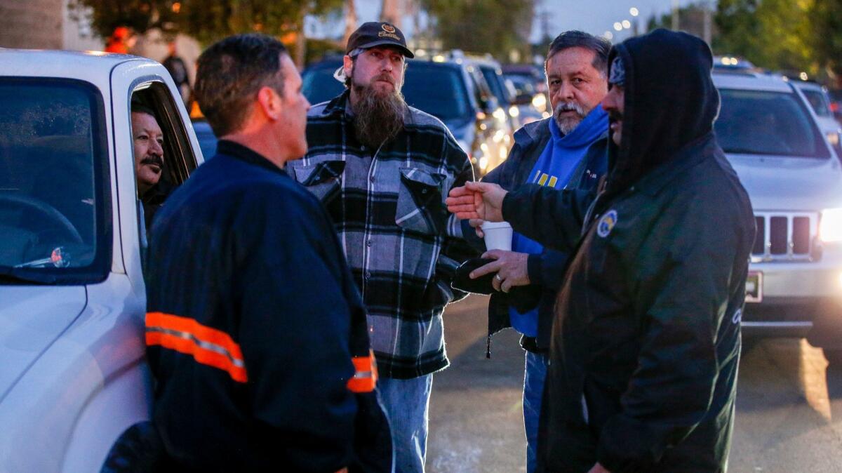 Part-time casual longshoremen outside the International Longshore and Warehouse Union Casual Longshore Dispatch Hall in Wilmington, where some lucky workers will nab a shift.