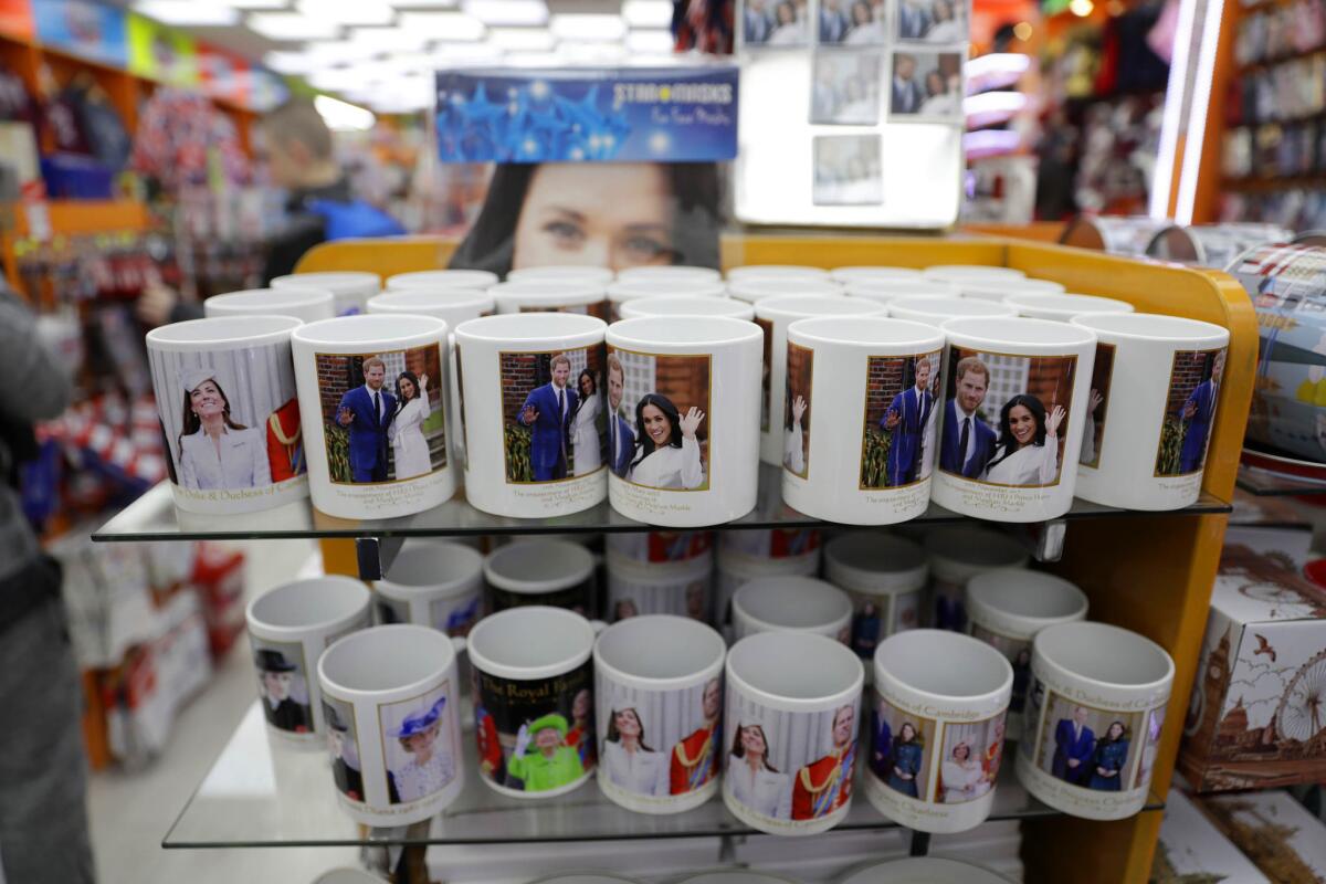 March 28, 2018: Mugs and other souvenir items for the upcoming wedding of Prince Harry and Meghan Markle are displayed for sale in a shop in London.
