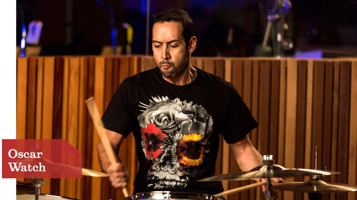 The inclusion of pre-existing pieces of music does not lessen the effect of Antonio Sanchez's clanging, tension-amping work.