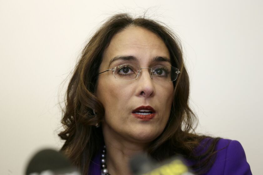 FILE - In this April 24, 2017, file photo, attorney Harmeet Dhillon speaks during a news conference in San Francisco. The lawyer leading the fight against California's stay-at-home orders has a long history of taking on free speech and civil rights cases. Dhillon has filed more than a dozen lawsuits challenging pieces of Gov. Gavin Newsom's stay-at-home orders. (AP Photo/Eric Risberg, File)