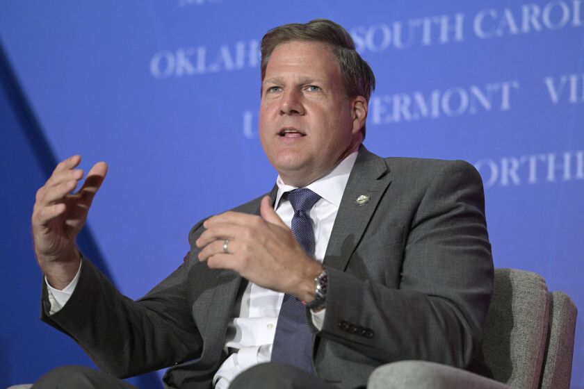 FILE - New Hampshire Gov. Chris Sununu takes part in a panel discussion during a Republican Governors Association conference on Nov. 15, 2022, in Orlando, Fla. (AP Photo/Phelan M. Ebenhack, File)