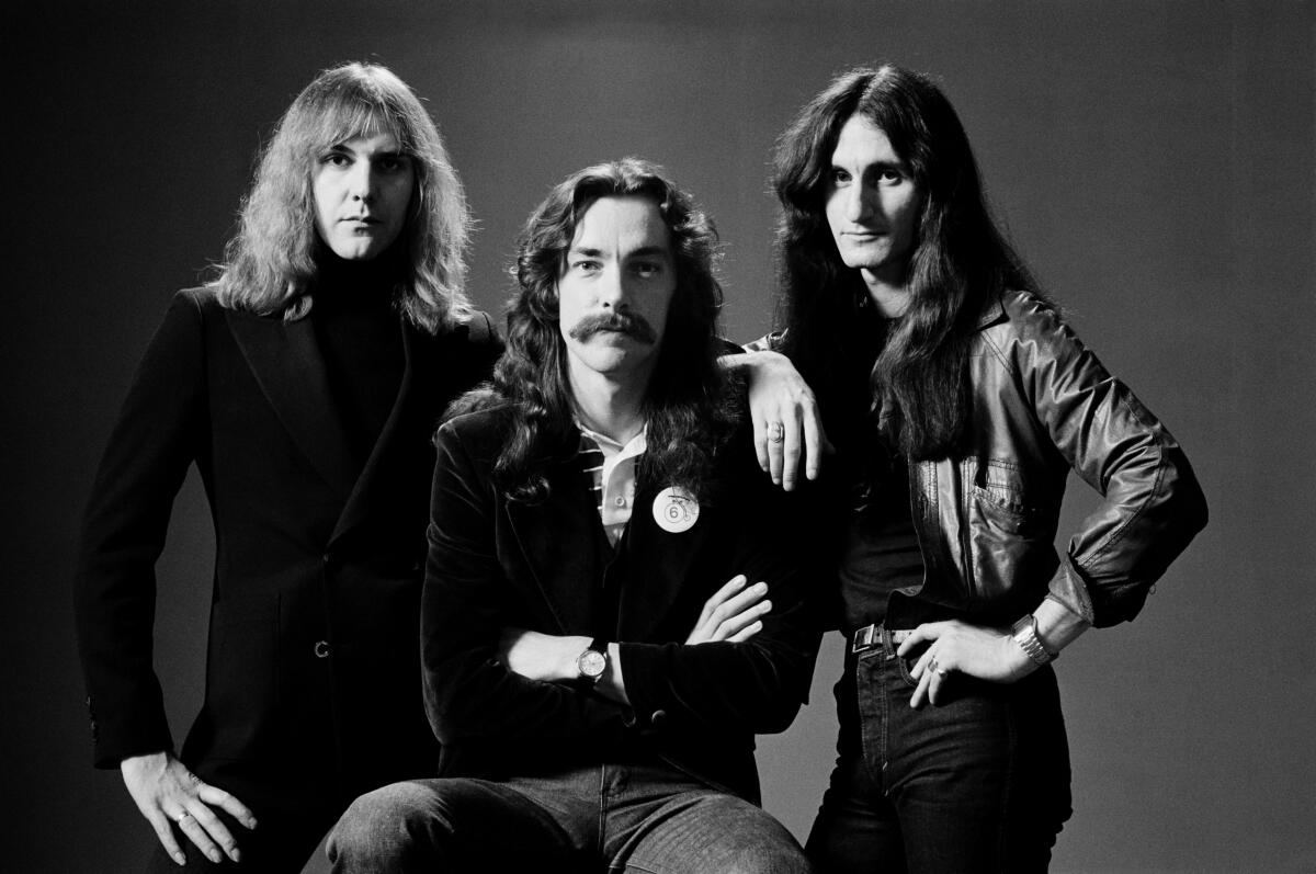 The rock trio Rush poses for portrait in 1978.