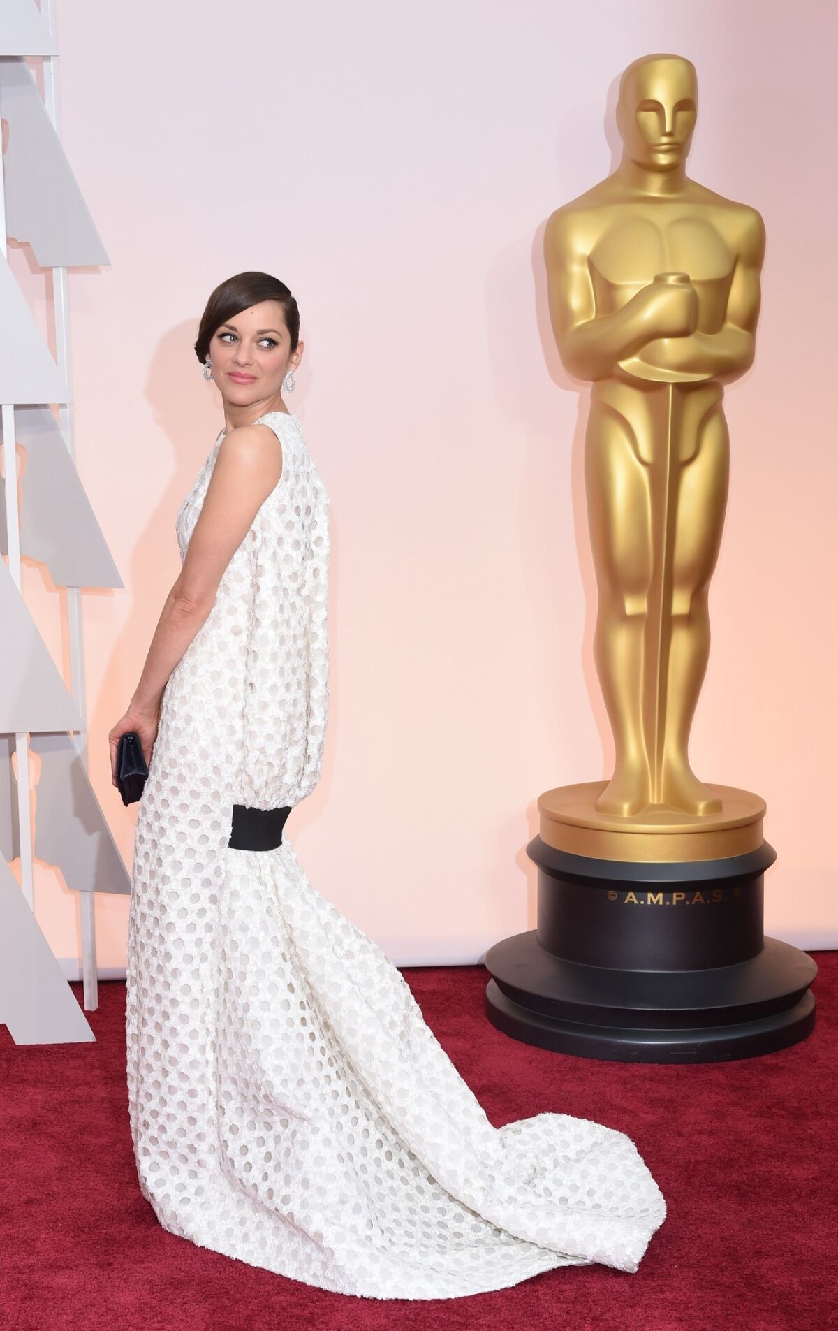 Nominee for Best Actress Marion Cotillard arrives on the red carpet for the 87th Oscars February 22, 2015 in Hollywood, California. AFP PHOTO / MARK RALSTONMARK RALSTON/AFP/Getty Images ** OUTS - ELSENT, FPG - OUTS * NM, PH, VA if sourced by CT, LA or MoD **