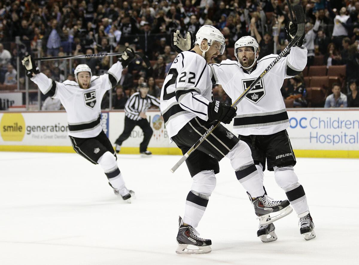 Kings' Trevor Lewis (22) celebrates his goal with Jarret Stoll during the first period against the Ducks on Feb. 27.