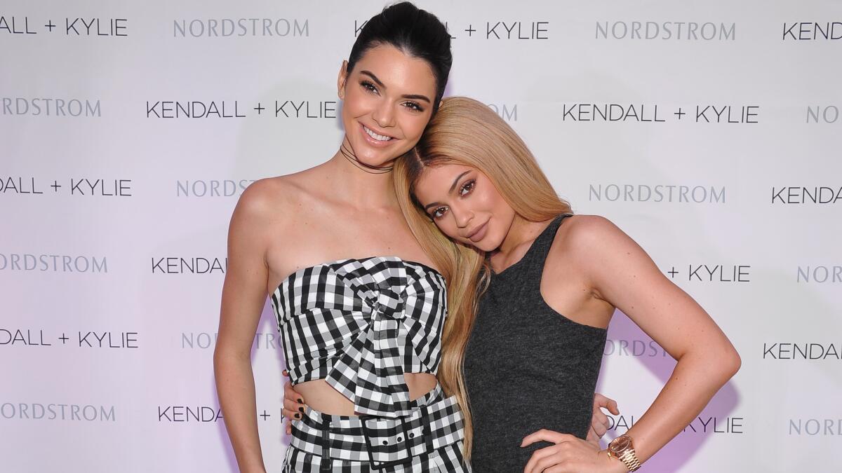 Kendall, left, and Kylie Jenner celebrate their new fashion label at private event at Chateau Marmont on March 24.