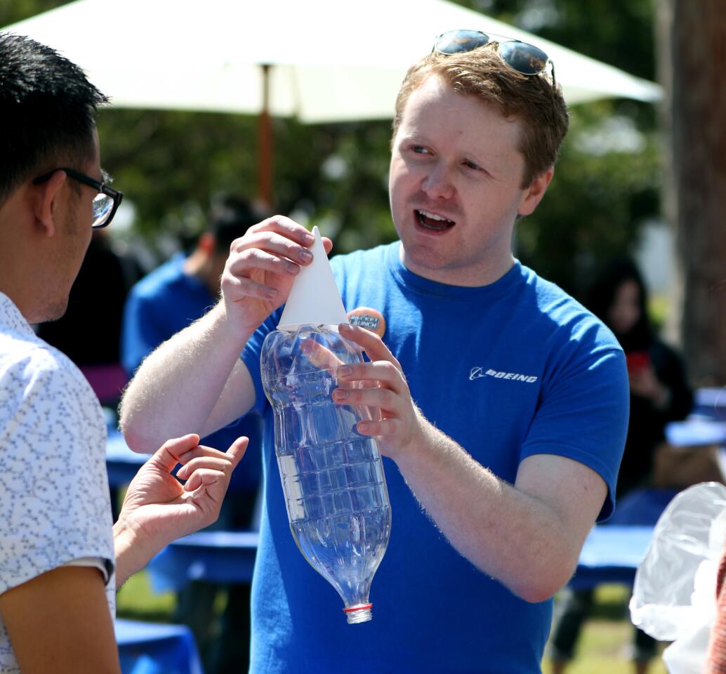 Photo Gallery: Soda bottle rockets launched during Discovery Cube event at Boeing