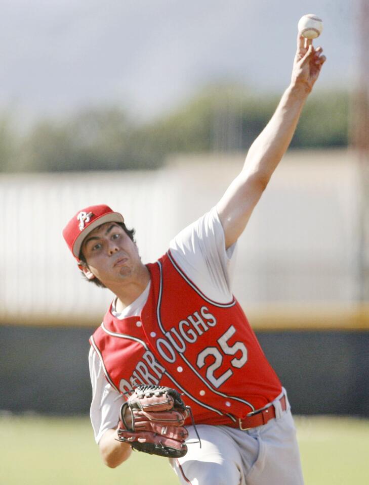 Burroughs' Daniel Barraza pitches the ball during a game against Glendale at Glendale High School on Tuesday, April 3, 2012.