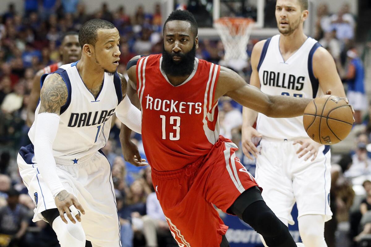Houston's James Harden drives past Dallas' Monta Ellis during a game in Dallas on April 2.