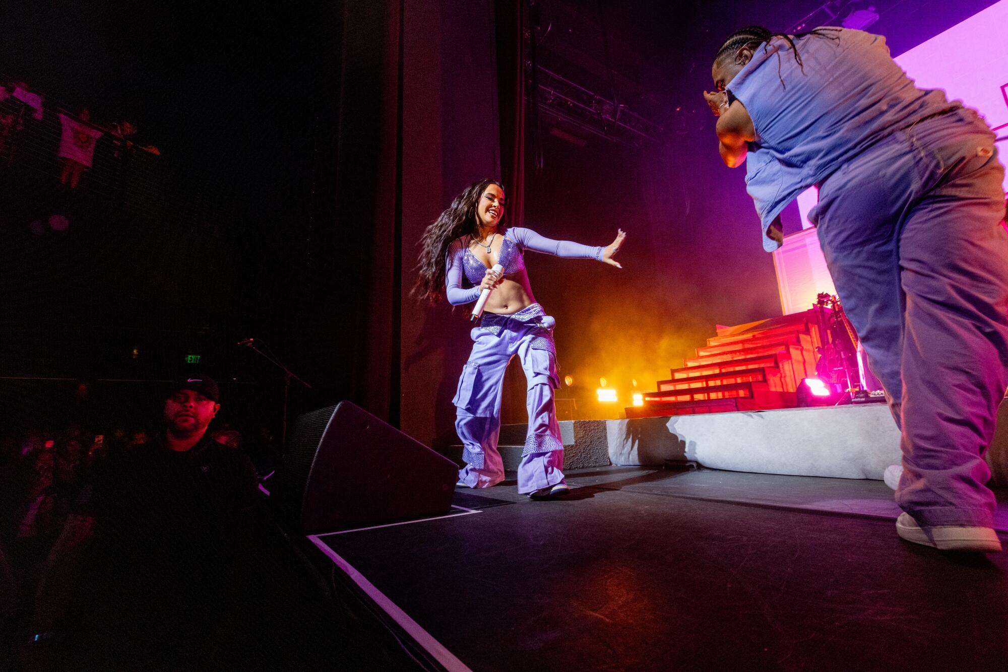 Becky G dances onstage