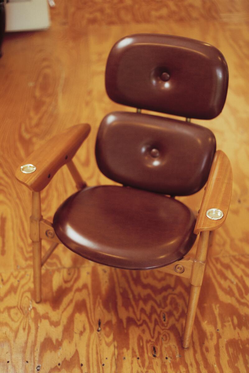 A chair with an ashtray in each armrest.