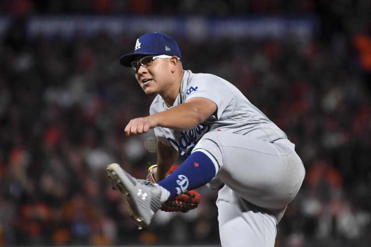 Dodgers starting pitcher Julio Urías delivers during the fifth inning of Game 2 of the NLDS.