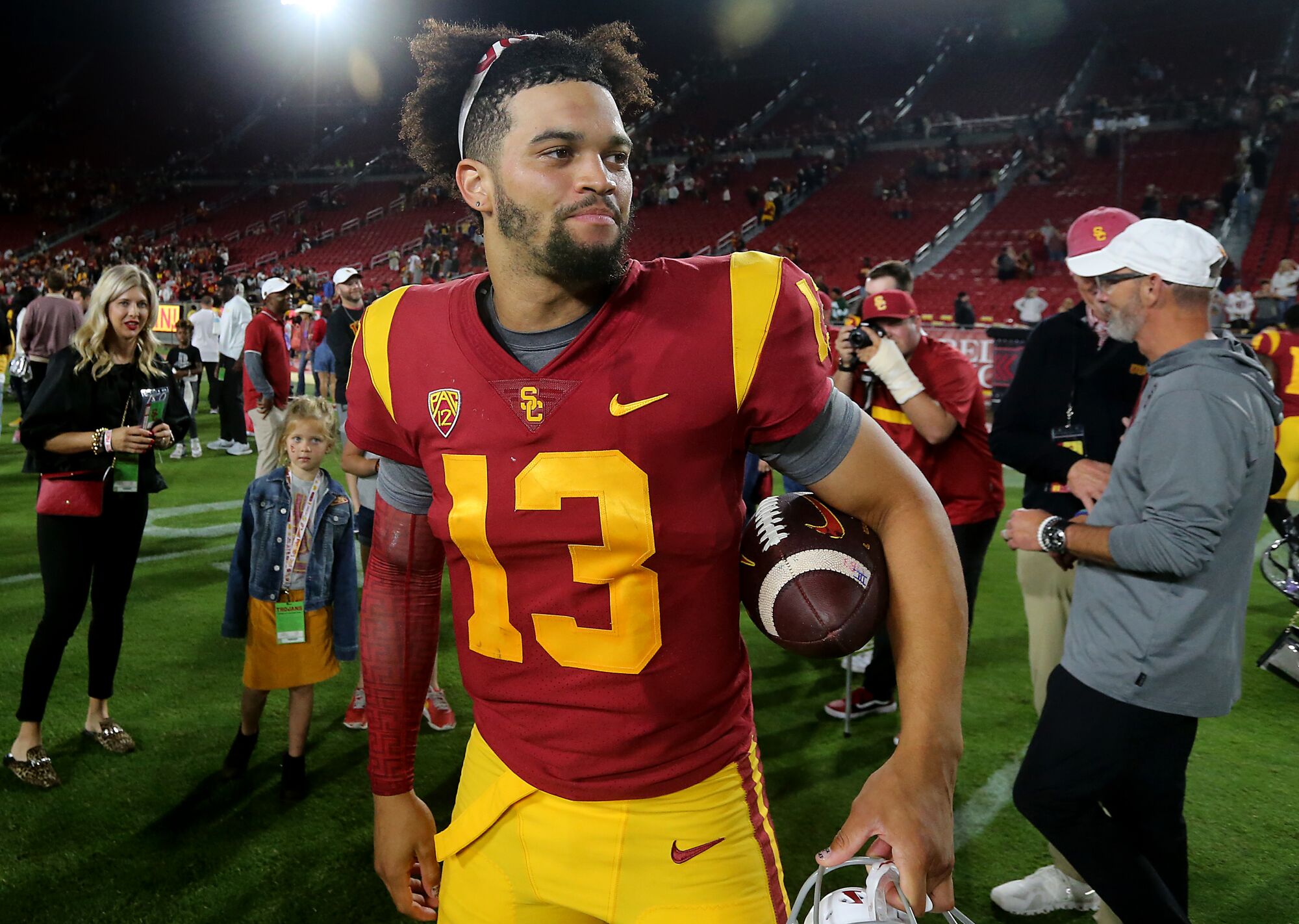 USC quarterback Caleb Williams walks off the field after a win over Arizona State at the Coliseum.