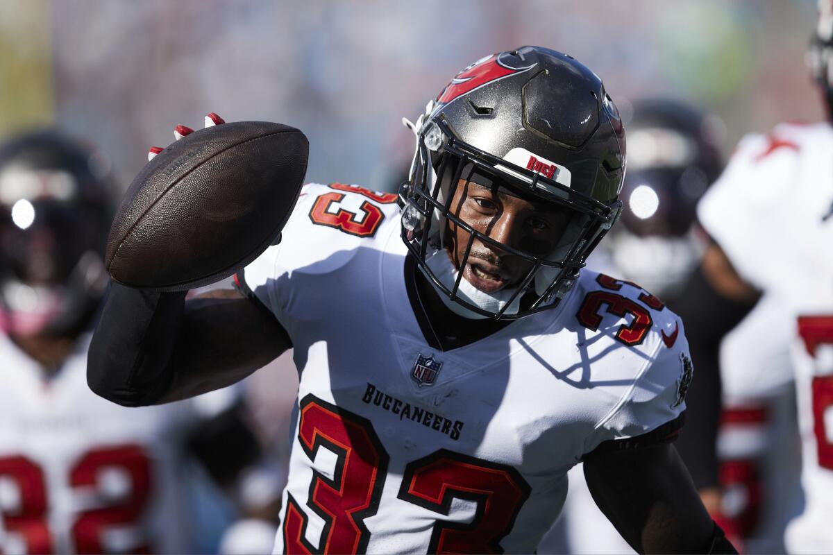 Tampa Bay Buccaneers free safety Jordan Whitehead celebrates after intercepting a pass.