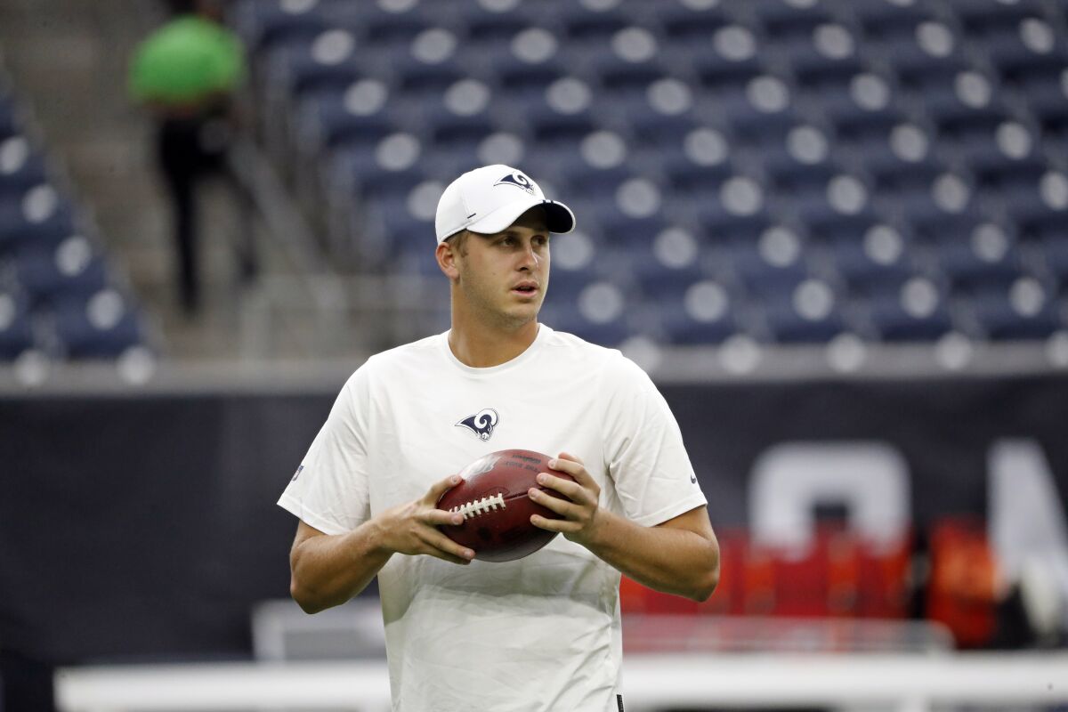 Rams quarterback Jared Goff warms up before a preseason game against the Houston Texans on Aug. 29 in Houston.