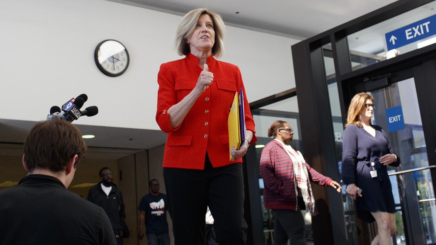 Sheila O’Brien, a former appellate judge pressing to probe the state’s attorney’s office, gestures while walking through the Leighton Criminal Court Building on May 23, 2019, in Chicago. She called the judge’s decision unsealing the court file a good first step.