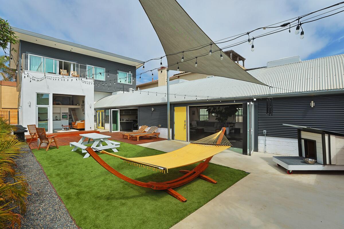 A courtyard next to the Quonset hut serves as a hangout.