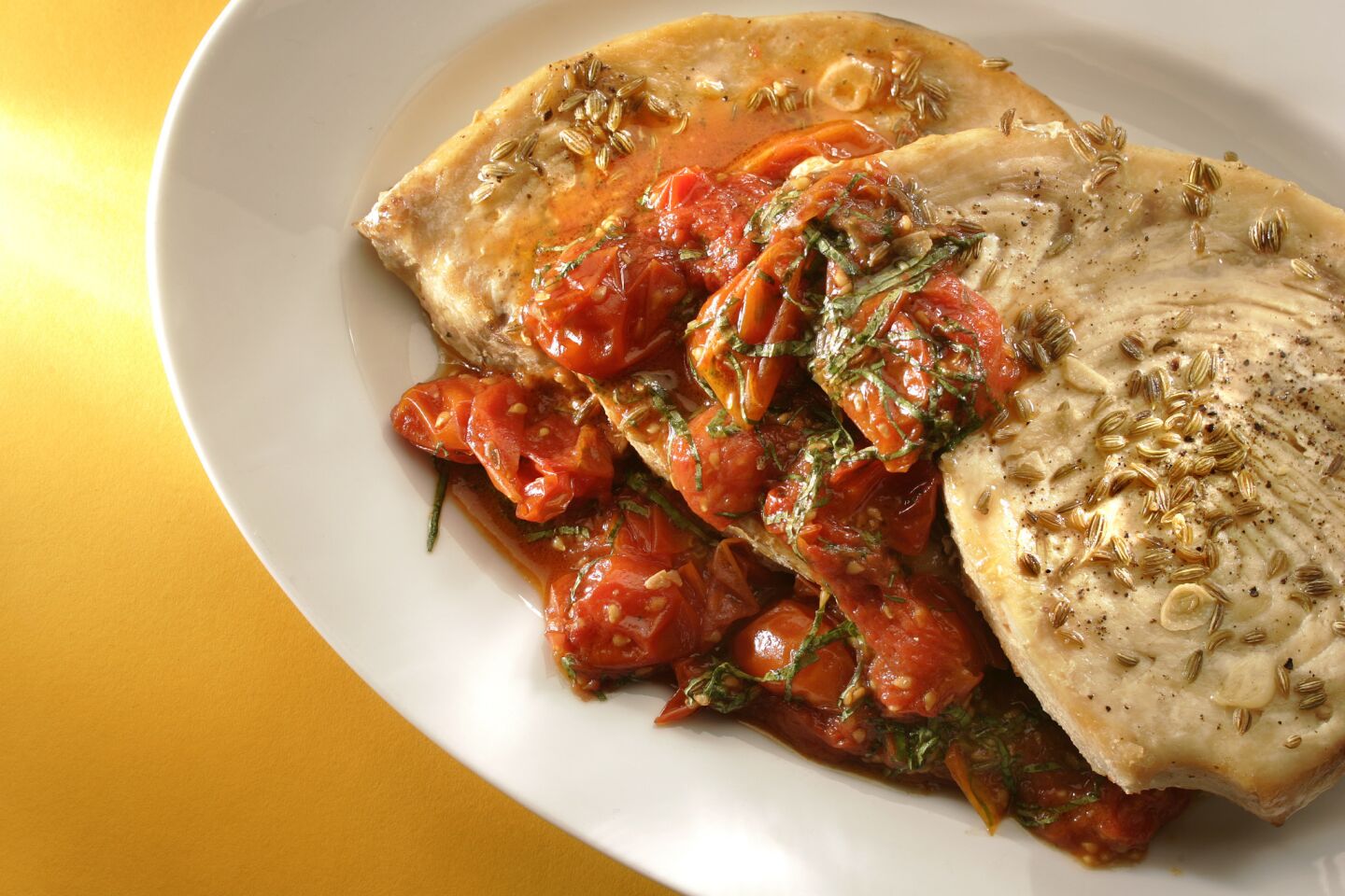 Colorful, bright with flavor, and simple to make. Recipe: Swordfish with tomatoes and fennel