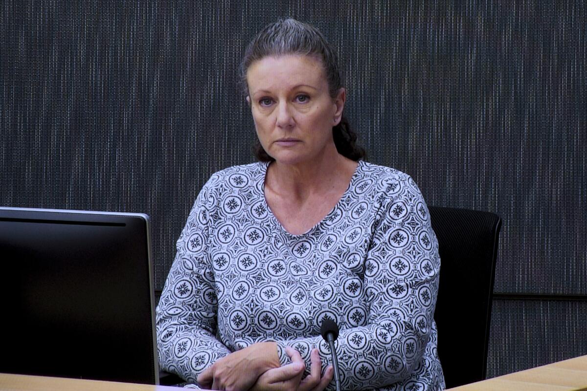 Kathleen Folbigg appears via video link during a convictions inquiry at the NSW Coroners Court in Sydney, Australia on May 1, 2019. An Australian inquiry began investigating on Monday, Nov. 14, 2022 whether the woman convicted of smothering her four children to death over a decade ago might be innocent. (Joel Carrett/AAP Image)