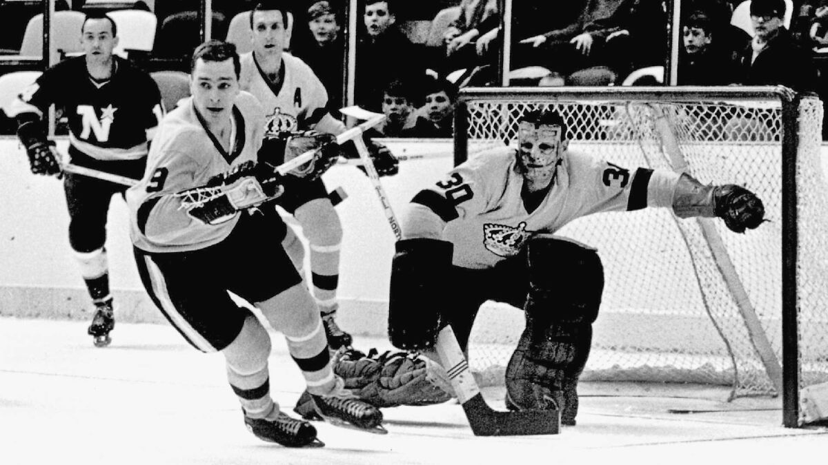 Goalie Terry Sawchuk of the Los Angeles Kings moves to make a save during an NHL game against the Minnesota North Stars circa 1967 at the Met Center in Bloomington, Minn.