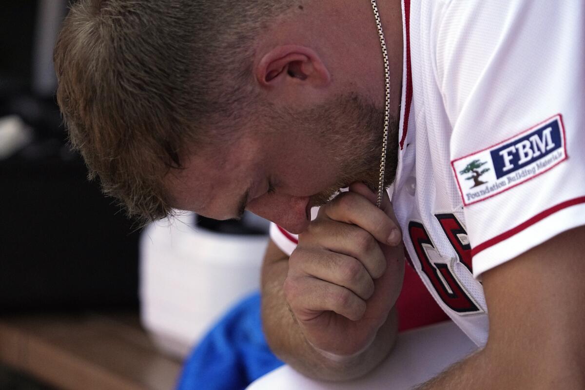 Angels' Reid Detmers pauses in the dugout prior to a game against the Arizona Diamondbacks on July 2, 2023, in Anaheim.