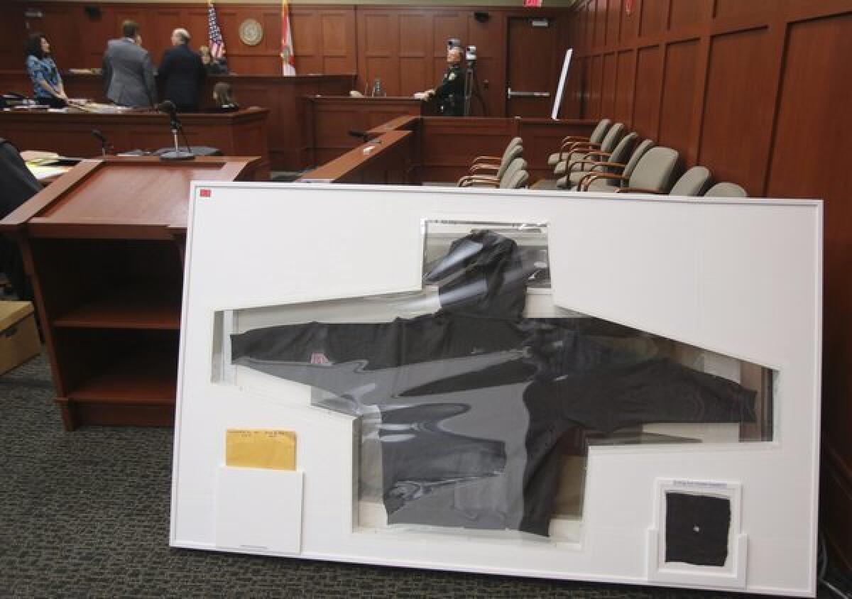 Trayvon Martin's hoodie is shown in a Florida courtroom. The Smithsonian has denied reports that it was interested in acquiring the hoodie for its collections.