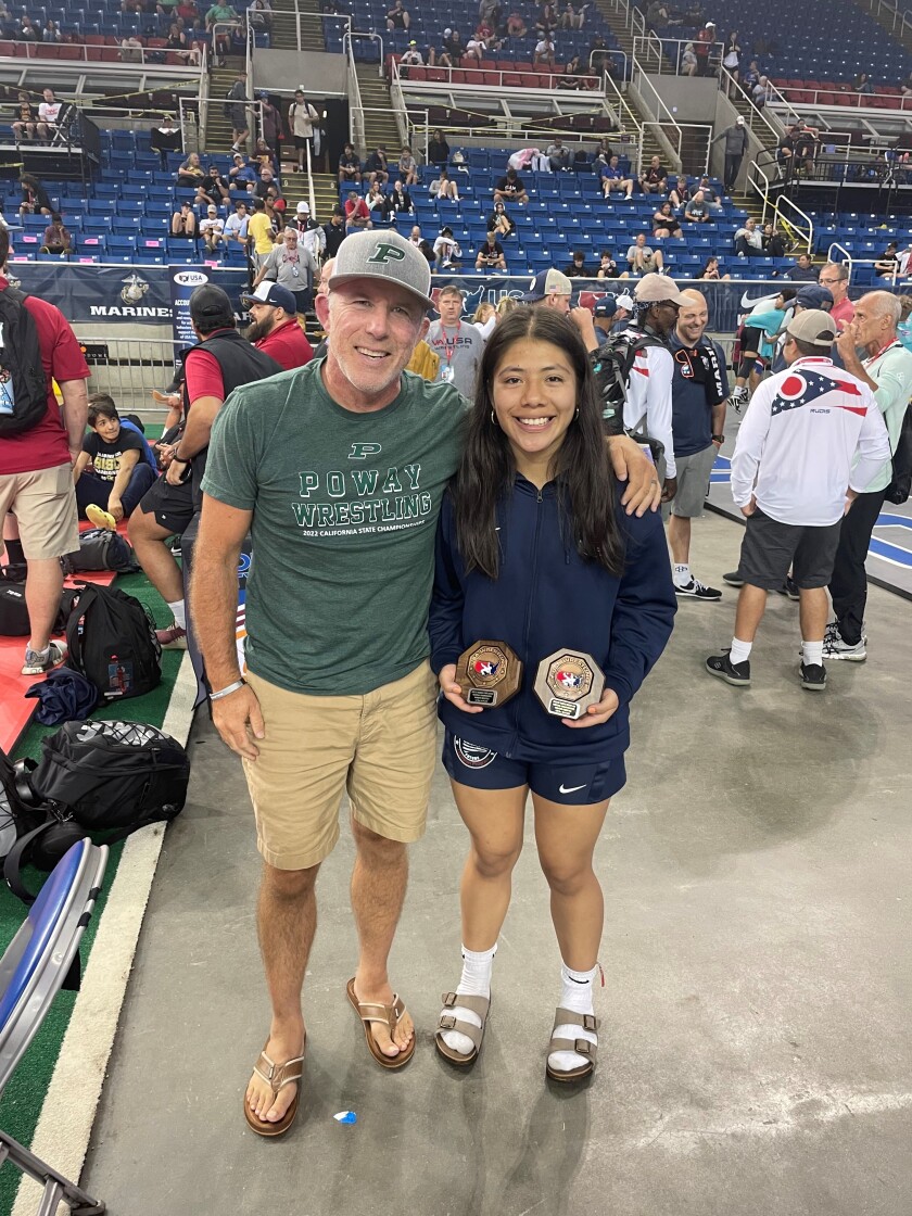 Junior Alejandra Valdiviezo, with her coach John Meyers, finished fourth in the 16U freestyle and sixth in the 18U freestyle.