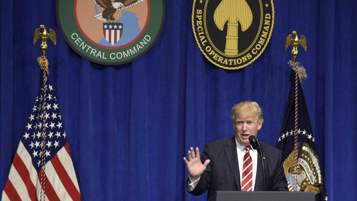 President Trump speaks to troops while visiting U.S. Central Command and U.S. Special Operations Command at MacDill Air Force Base in Tampa, Fla.