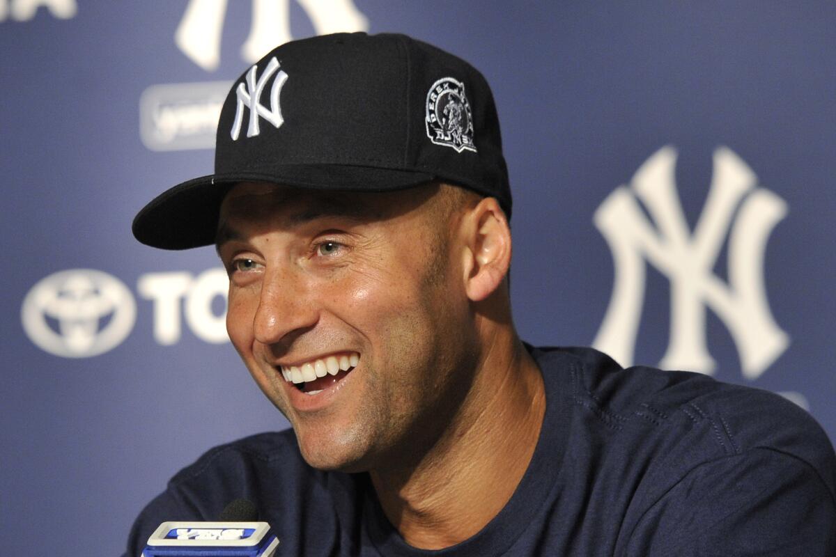 New York Yankees great Derek Jeter speaks during a news conference in 2011.