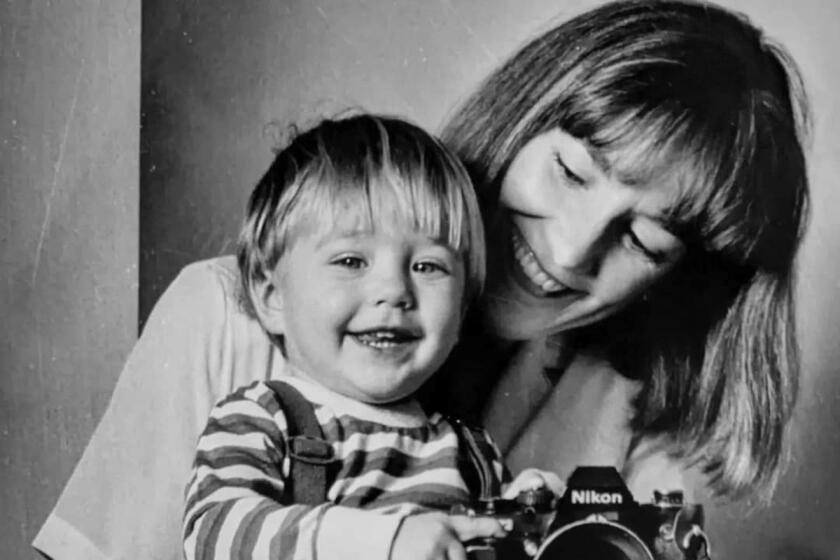 An undated photo of Anne Cusack with her son, George.