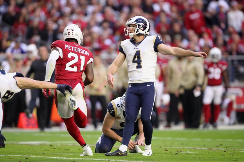 GLENDALE, ARIZONA - DECEMBER 01: Kicker Greg Zuerlein #4 of the Los Angeles Rams kicks a 27 yard field goal against the Arizona Cardinals during the first half of the NFL game at State Farm Stadium on December 01, 2019 in Glendale, Arizona. (Photo by Christian Petersen/Getty Images)