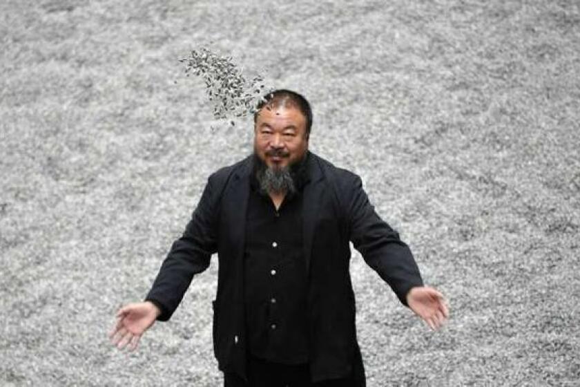 Artist Ai Weiwei with his "Sunflower Seeds" installation.