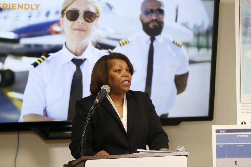 JWA director Charlene Reynolds introduces the launch of the new "Fly Friendly" program at the John Wayne Airport administration offices on Wednesday. The education and outreach program is designed to minimize noise and environmental impacts from General Aviation (GA) jet aircraft in the communities surrounding John Wayne Airport.