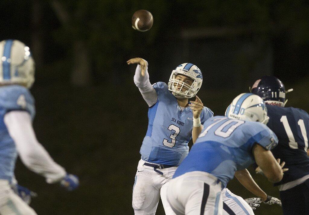 Corona del Mar High quarterback Chase Garbers helped lead the Sea Kings past the Sailors with two rushing touchdowns.