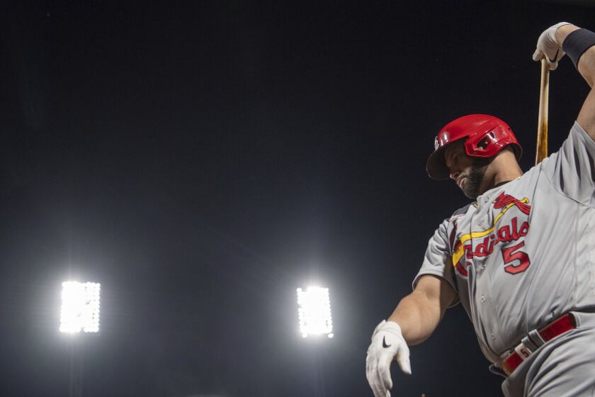 The Cardinals' Albert Pujols warms up before stepping up to the plate on Monday, Oct. 3, 2022, at a baseball game against the Pittsburgh Pirates in Pittsburgh. (Emily Matthews/Pittsburgh Post-Gazette via AP)