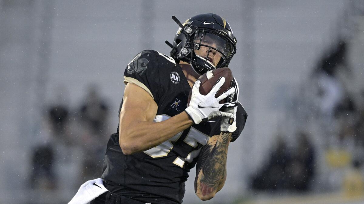 Central Florida's Jacob Harris warms up before an NCAA college football game against Tulsa.