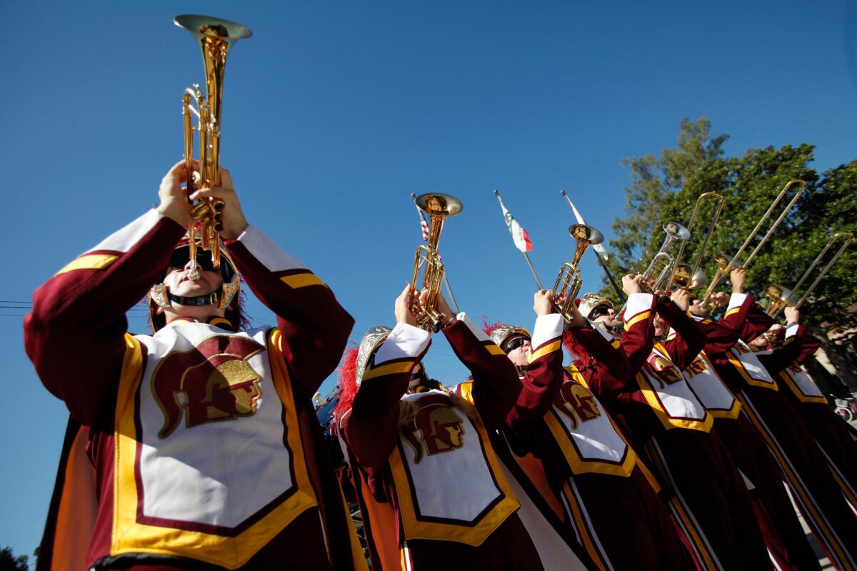 The USC Trojan Marching Band performs before a 2013 news conference.