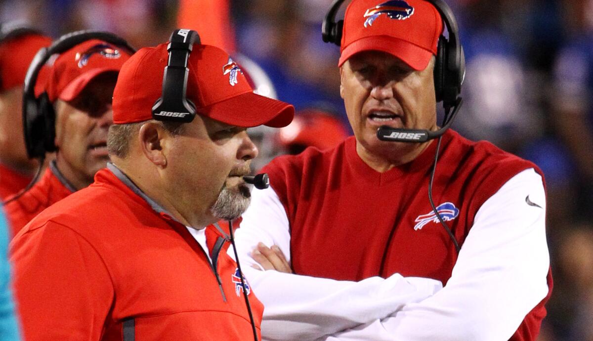 Greg Roman, left, was offensive coordiator for Coach Rex Ryan in Buffalo.