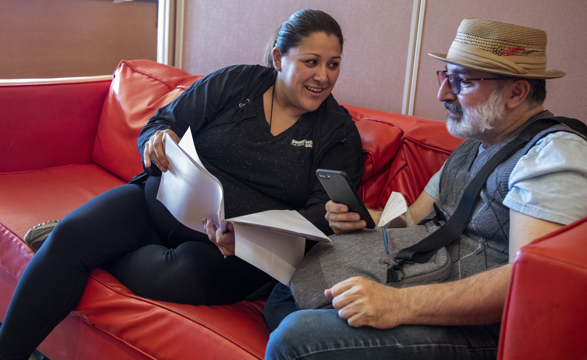 Yelyna De Leon, left, looks over a script with Edward Padilla at Casa 0101 Saturday, July 31, 2021 in Boyle Heights 